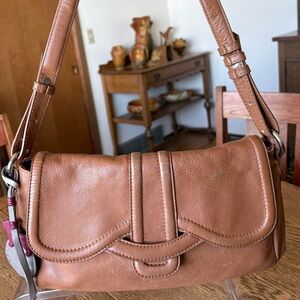 Radley London tan leather shoulder bag featuring charms